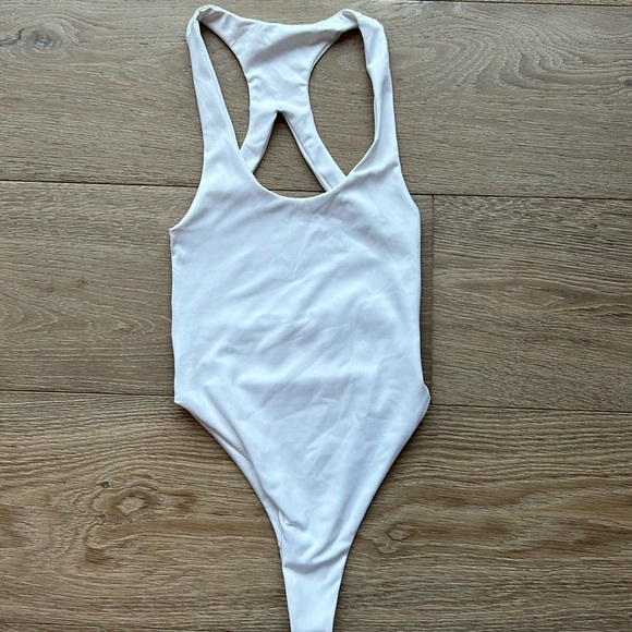 Tracy Anderson sexy, strappy back white bodysuit, Size XS - Picture 1 of 4